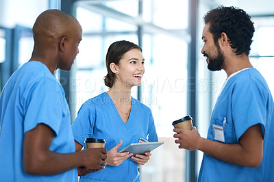 Buy stock photo Medical, people and staff discussion in hospital, tablet and conversation for health research with nurse interns together. Talking, report and happy or professional employees, wellness and teamwork