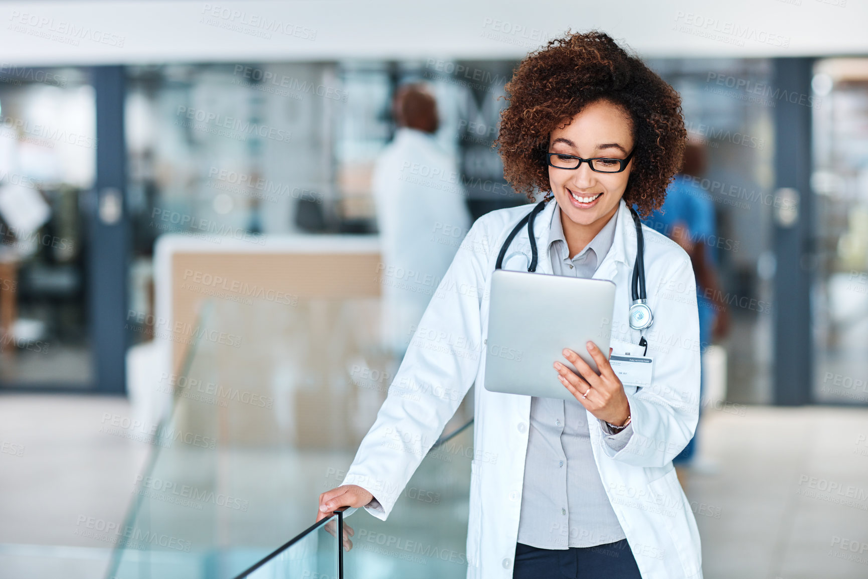 Buy stock photo Healthcare, smile and doctor with tablet for diagnosis, telehealth and feedback in hospital. Happy woman, medical specialist and tech in lobby for contact, information and positive review in clinic