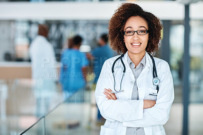 Buy stock photo Portrait of a young doctor standing in a hospital