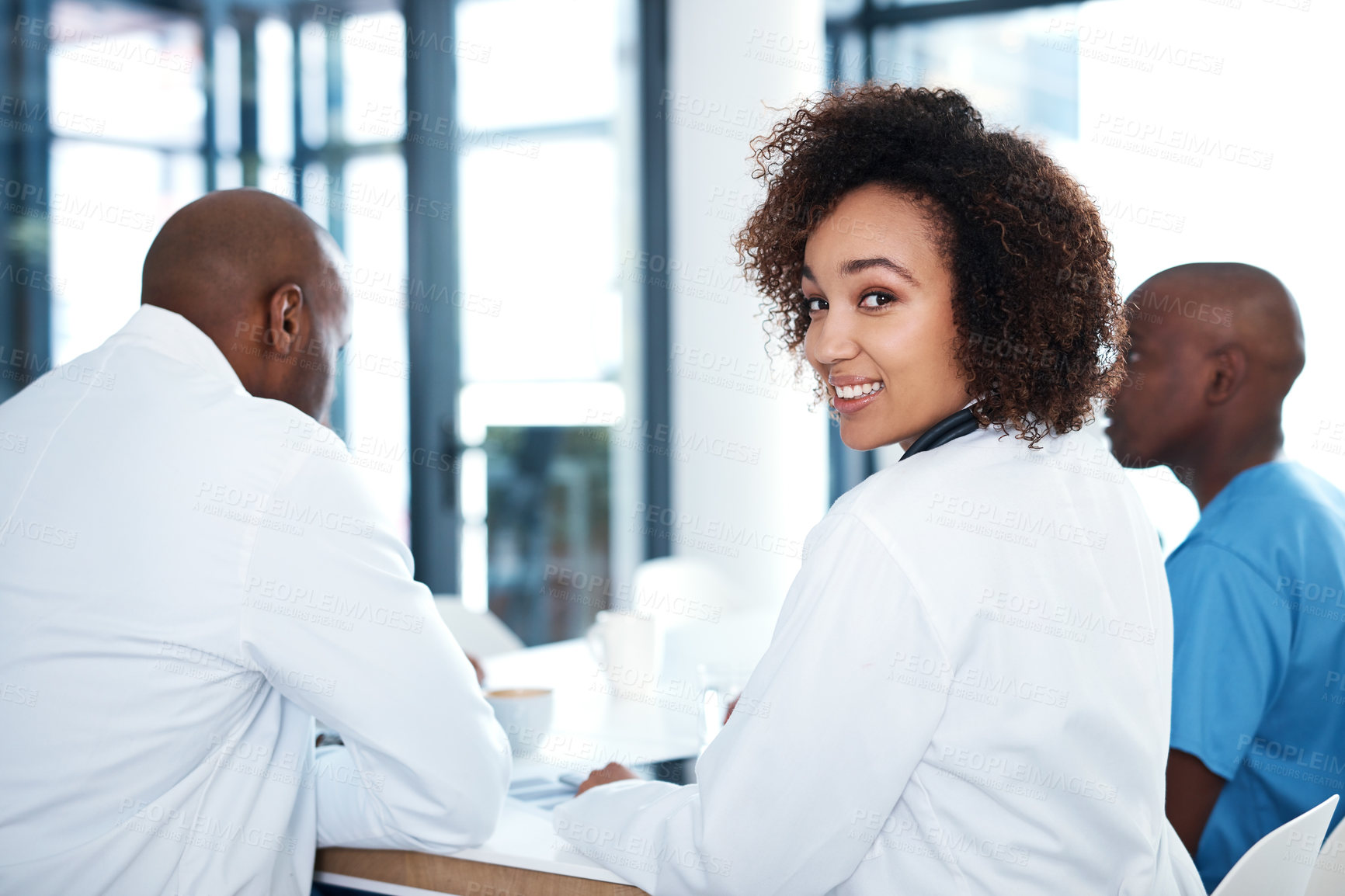 Buy stock photo Medical, meeting and portrait of woman doctor in hospital boardroom for collaboration or planning. Cardiology, smile and support with healthcare group or team in clinic for integrity or trust