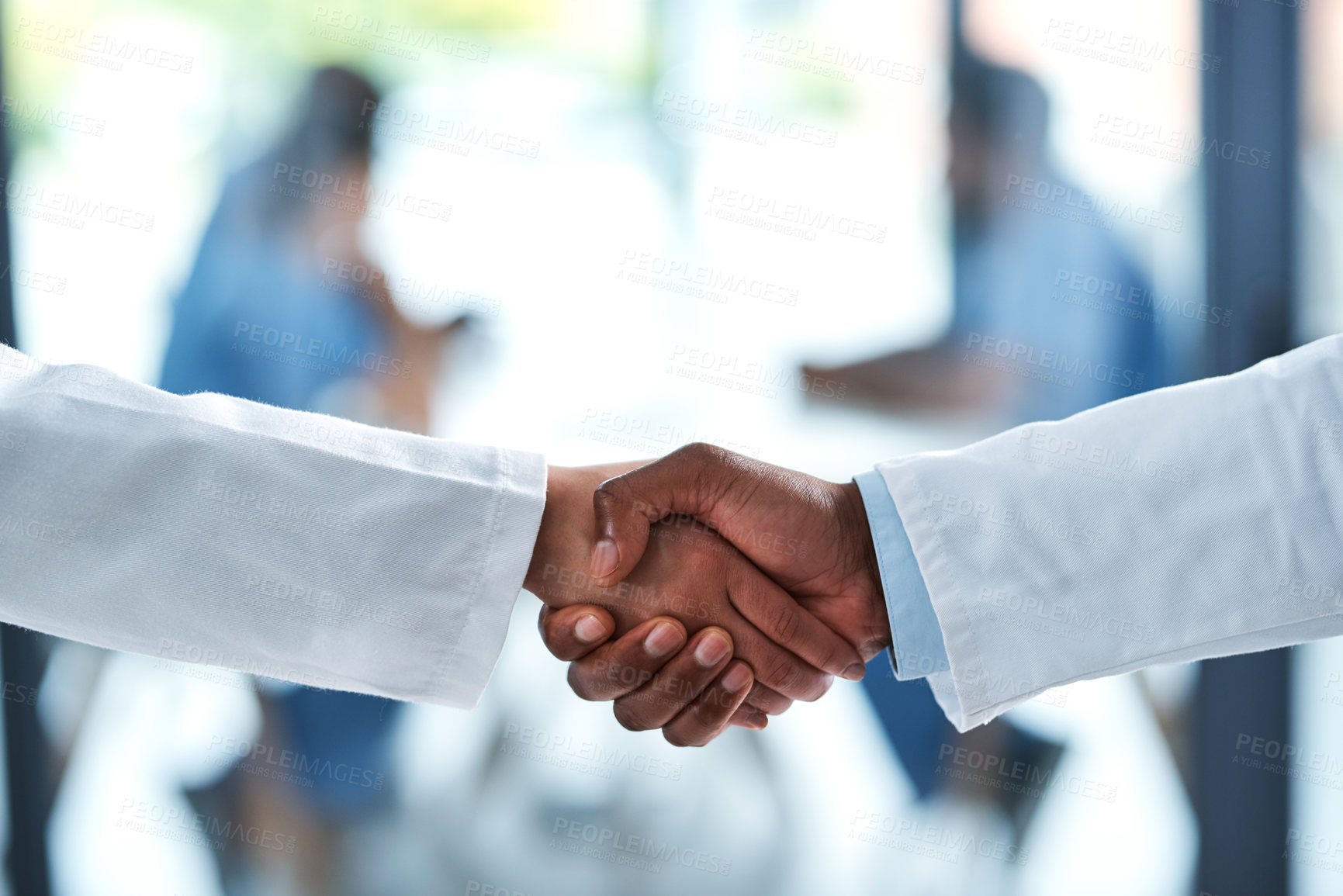 Buy stock photo People, medical and doctor handshake in hospital, medicine and wellness with healthcare professional. Trust, support and shaking hands for partnership or clinic collaboration, thank you and welcome