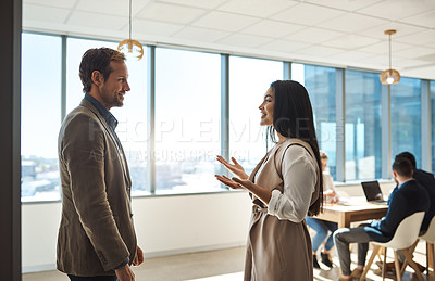 Buy stock photo Shot of businesspeople having a discussion in an office