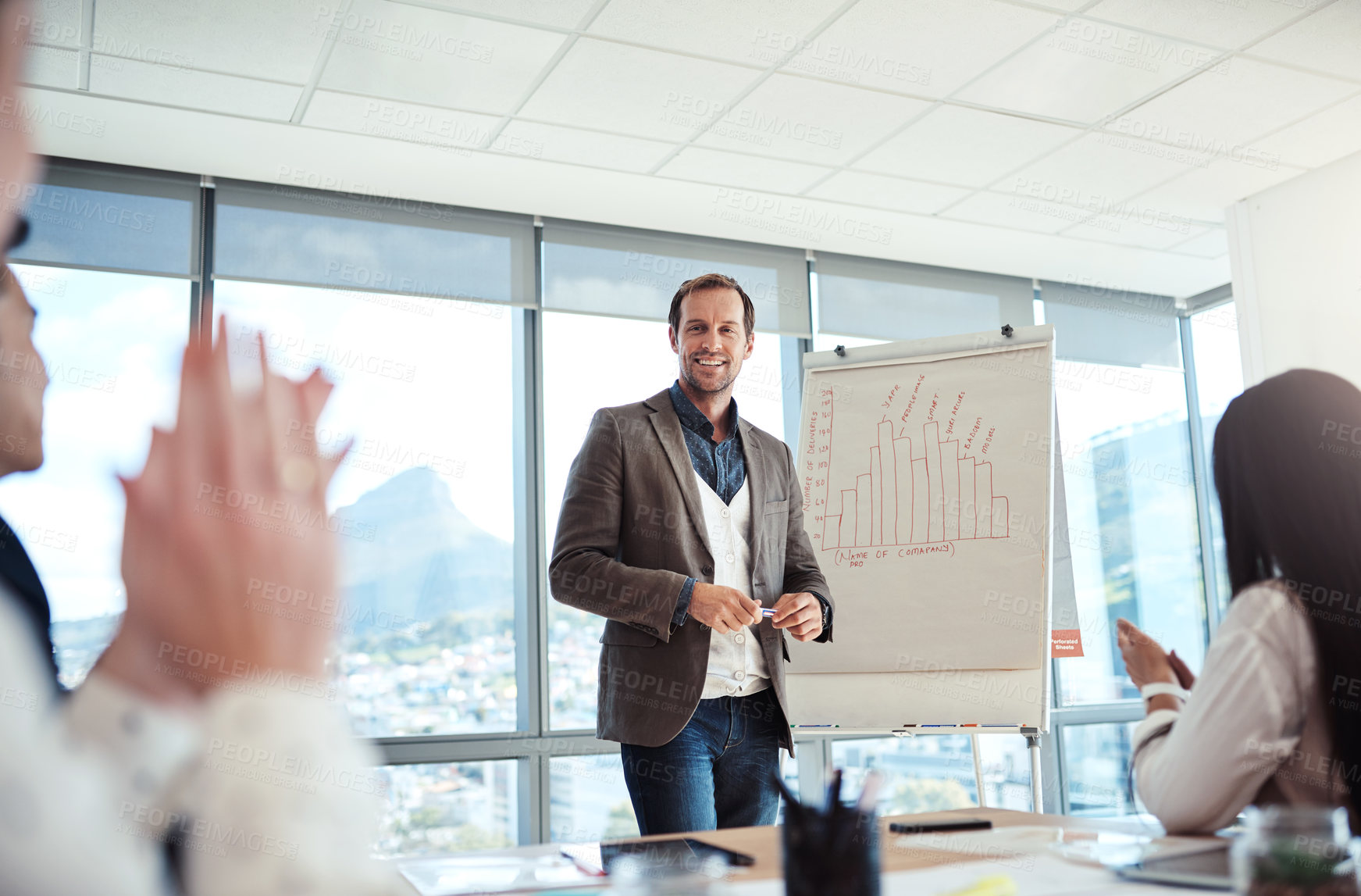 Buy stock photo Shot of businesspeople applauding during a presentation in an office