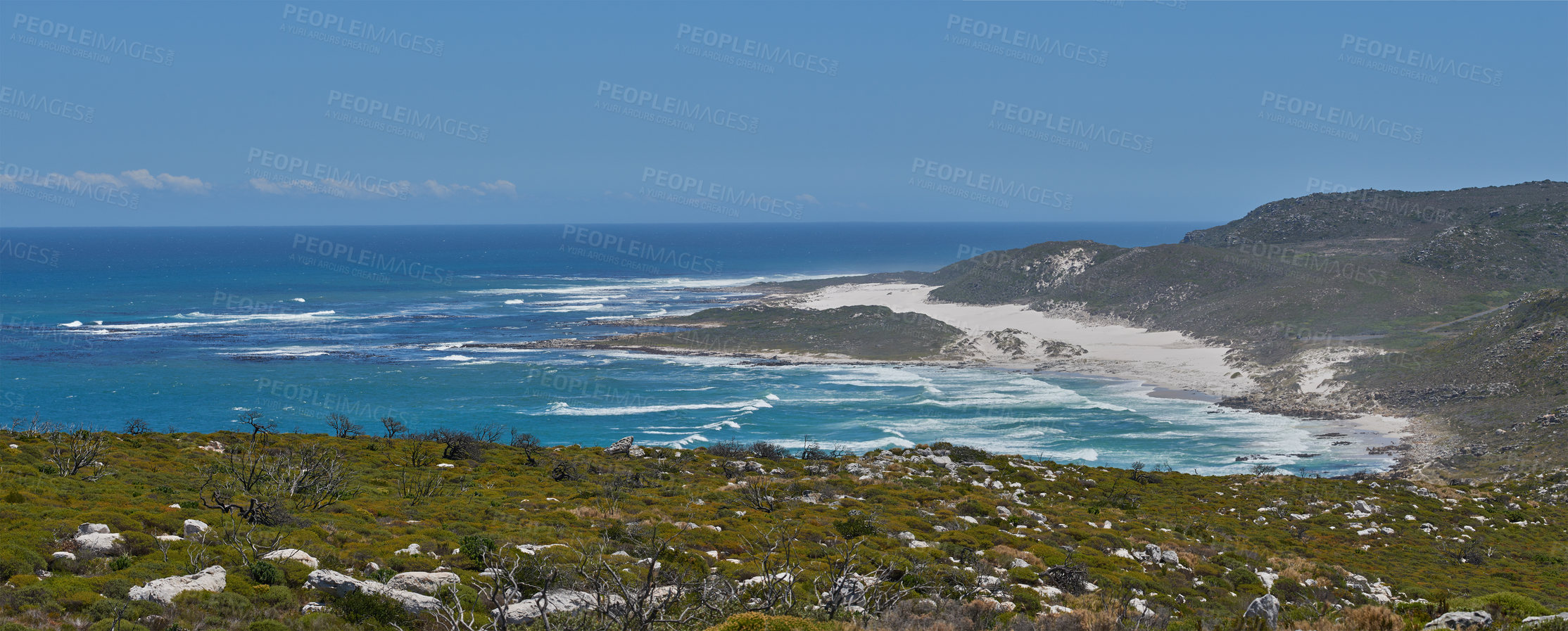 Buy stock photo Copyspace at sea with a clear blue sky background and calm coast in Western Cape, South Africa. Ocean waves crash onto the shore at a beach. A peaceful scenic landscape for a relaxing summer holiday