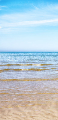 Buy stock photo Copy space at the beach with a blue sky background above the horizon. Calm ocean waves across an empty sea along the sandy shore. Peaceful and tranquil landscape for a relaxing and zen summer holiday