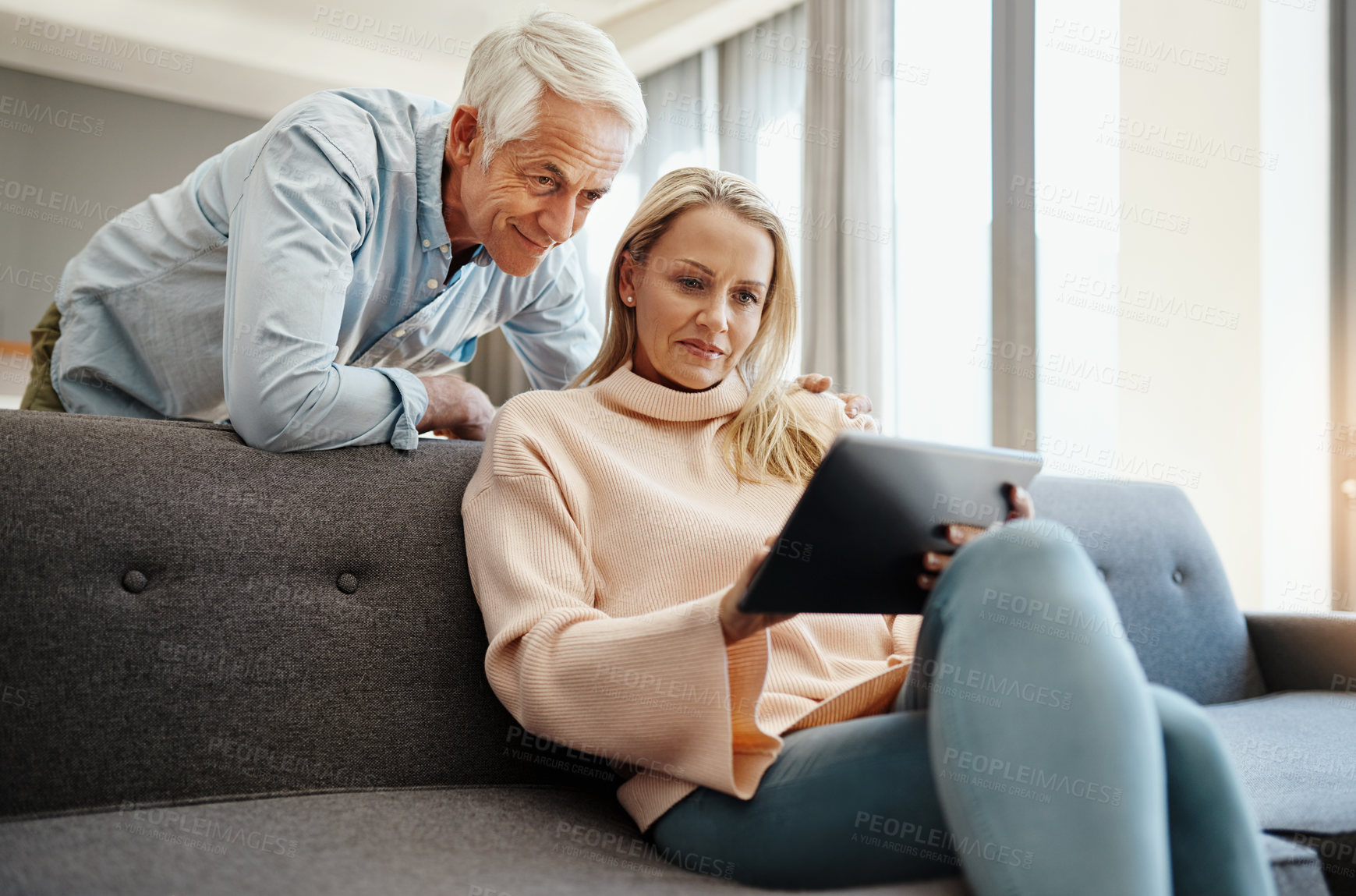 Buy stock photo Tablet, plan and couch with couple and digital banking with budget and financial decision. Discussion, marriage and tech of mature people together in living room with home and retirement talk