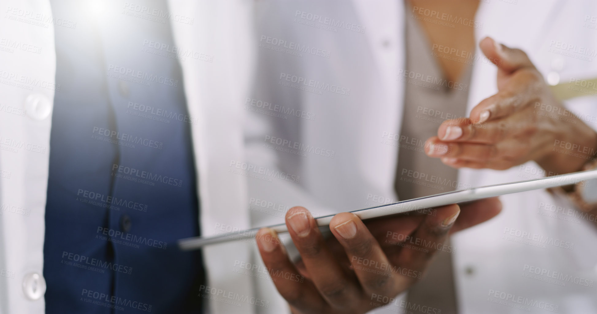 Buy stock photo Pharmacist, hands and tablet with discussion for medical study, healthcare or research at pharmacy. Closeup of person explaining with technology in telehealth for new drug or online pharmaceutical