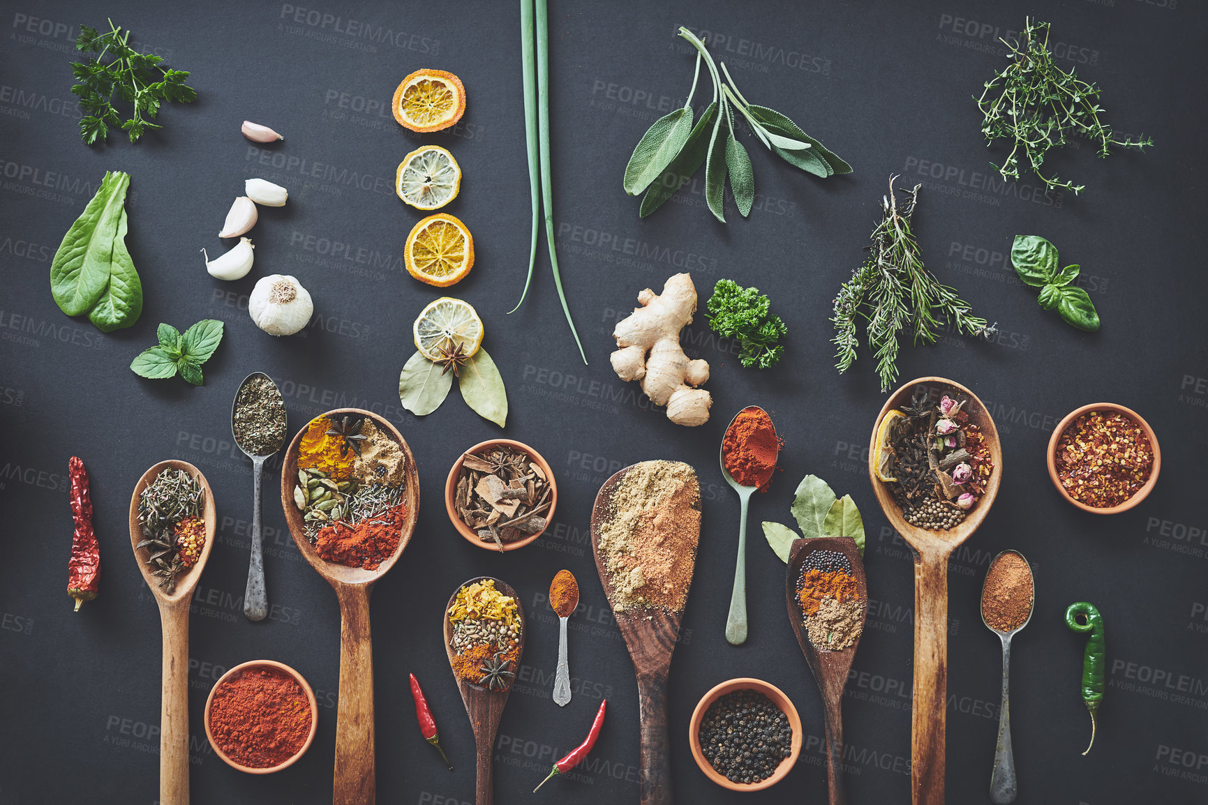 Buy stock photo Table, above and group of spices for seasoning, curry and ingredients for flavor on background. Row, top view and collection of herbs or organic turmeric, textures and culinary condiments for food