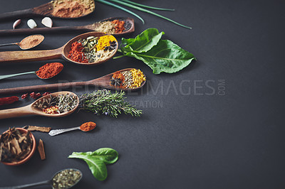 Buy stock photo Kitchen, curry and spices with spoon, table or ingredients for flavor, mockup space and cooking. Seeds, leaves and above utensils on counter for meal prep, cinnamon or rosemary for food at restaurant