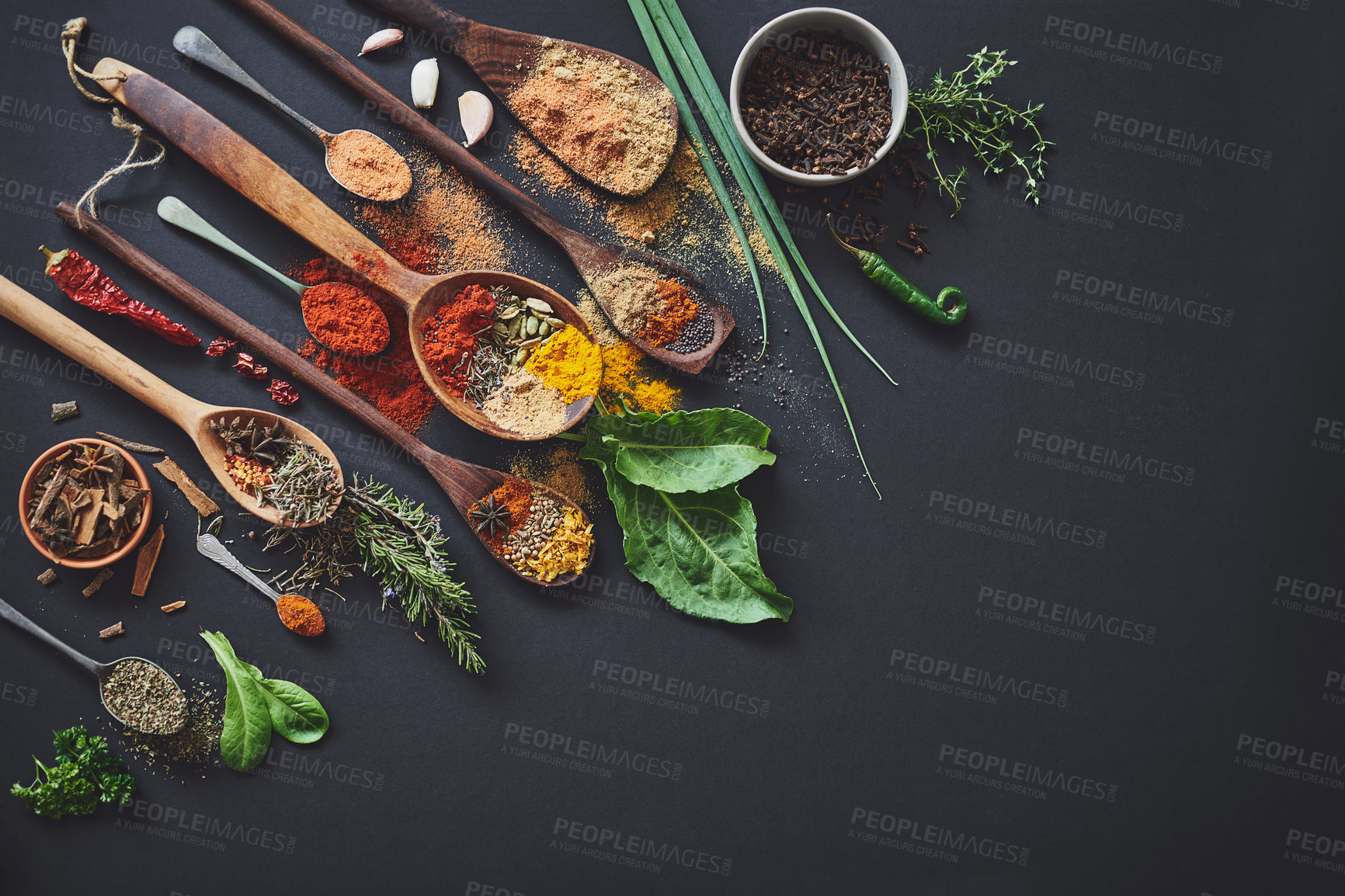 Buy stock photo Kitchen, spices and herbs on table for culinary ingredients, flavor and mockup space with leaves for cooking. Seeds, powder and above counter with meal prep, curry and variety for food at restaurant