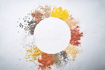 Buy stock photo Circle, seasoning and spices by white background for ingredients, herbs and aroma for sensory appeal with culinary. Space, powder and flavor for cooking with condiment, pepper and curry in studio