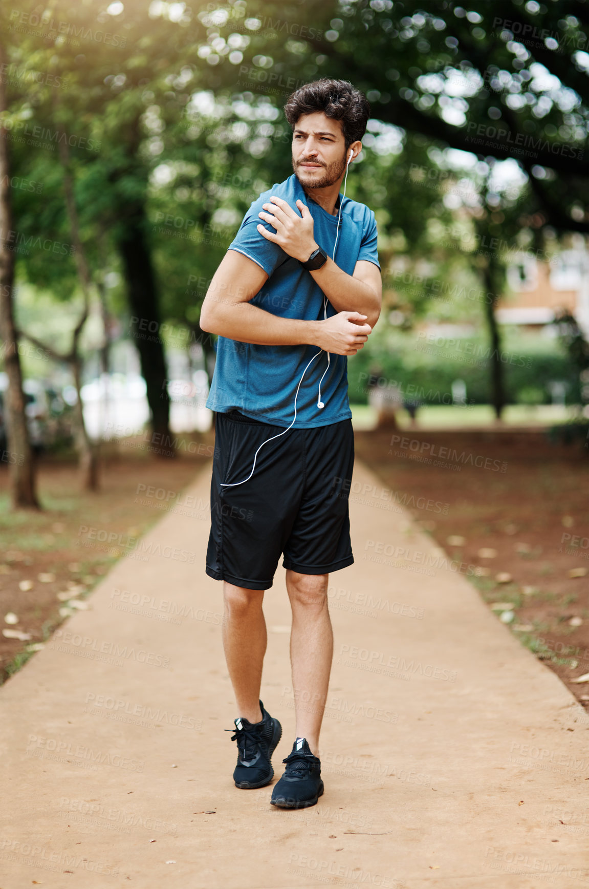 Buy stock photo Fitness, man and athlete outdoor with shoulder pain of exercise injury, running accident and medical problem. Runner, person and body inflammation on morning jog with earphones, uncomfortable or ache