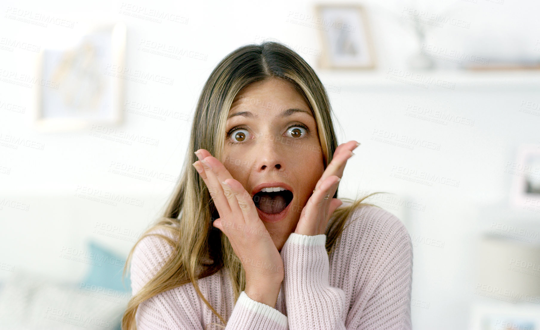 Buy stock photo Cropped shot of a woman looking surprised