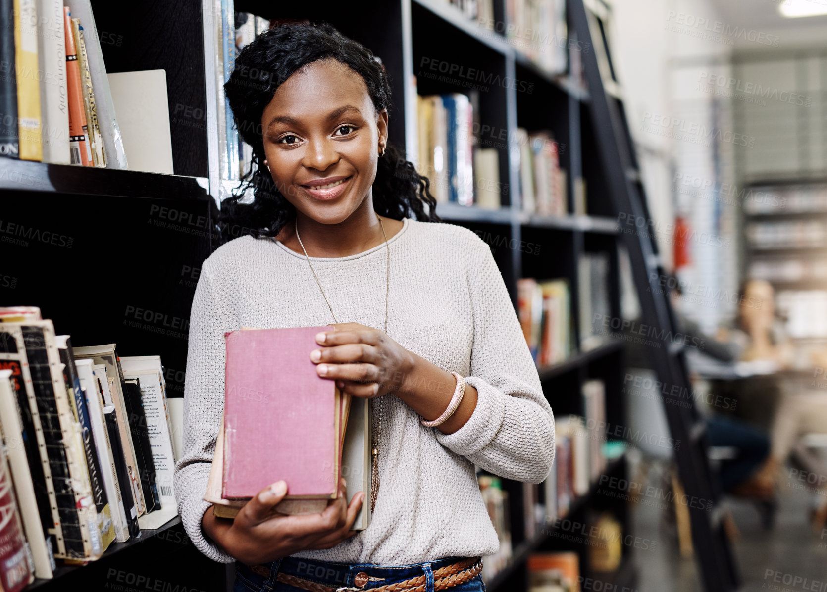 Buy stock photo Shelf, portrait or happy black woman with book in library for education, opportunity or study at college. Smile, school or proud student learning for research, knowledge and scholarship at university