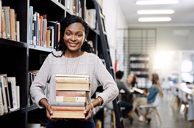Buy stock photo Black woman, student with book stack in library and research for project, study and learn on university campus. African female person smile in portrait, education and scholarship with course material