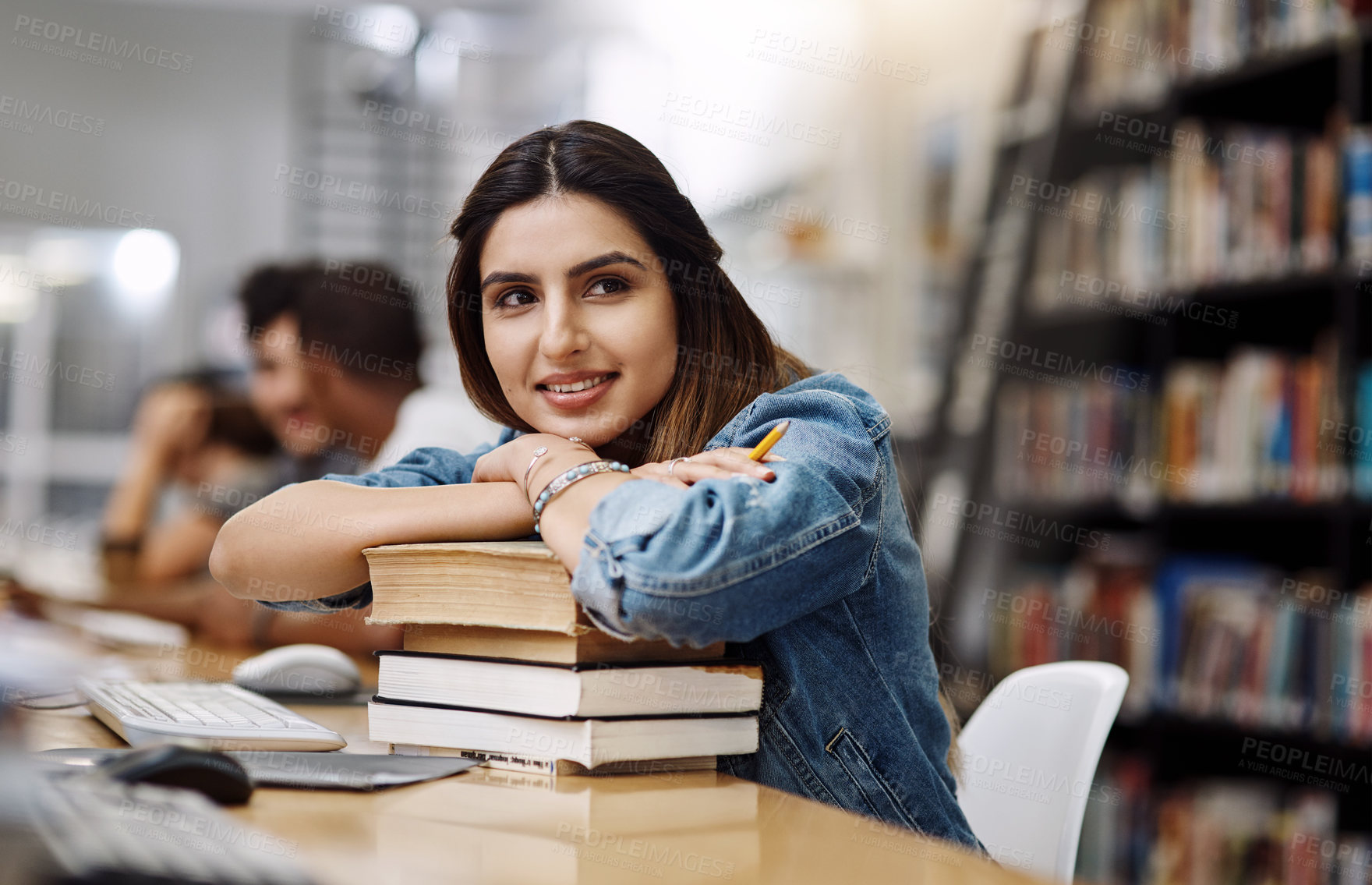 Buy stock photo Education, smile and woman in library, thinking and books for learning, studying or university. Scholarship, student and contemplating for knowledge, pile and Indian person in college, ideas or relax