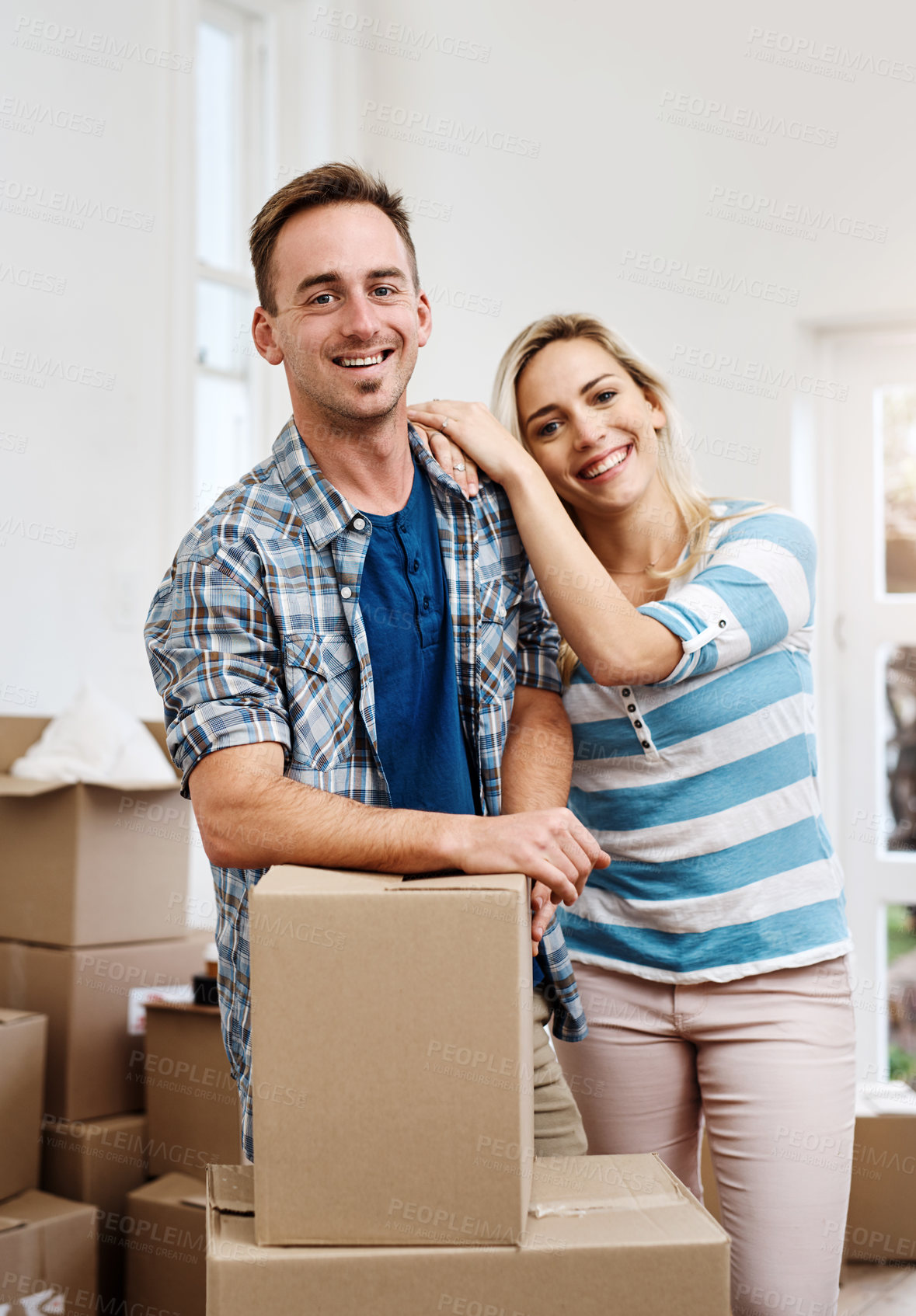 Buy stock photo Portrait, couple and investment of home, box and man in living room, happy and mortgage for real estate in apartment. Woman, new house and moving with packages, smile and loan for property in USA