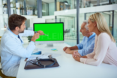 Buy stock photo Doctor, people and computer green screen for patient test results, digital xray and discussion of treatment plan. Senior father, woman and surgeon pointing to chroma key display for medical diagnosis