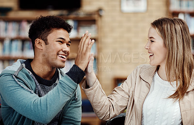 Buy stock photo Woman, man and high five at college for education, teamwork or success for thesis. Students, celebrate and happiness with hands together for knowledge, collaboration or partnership for school work