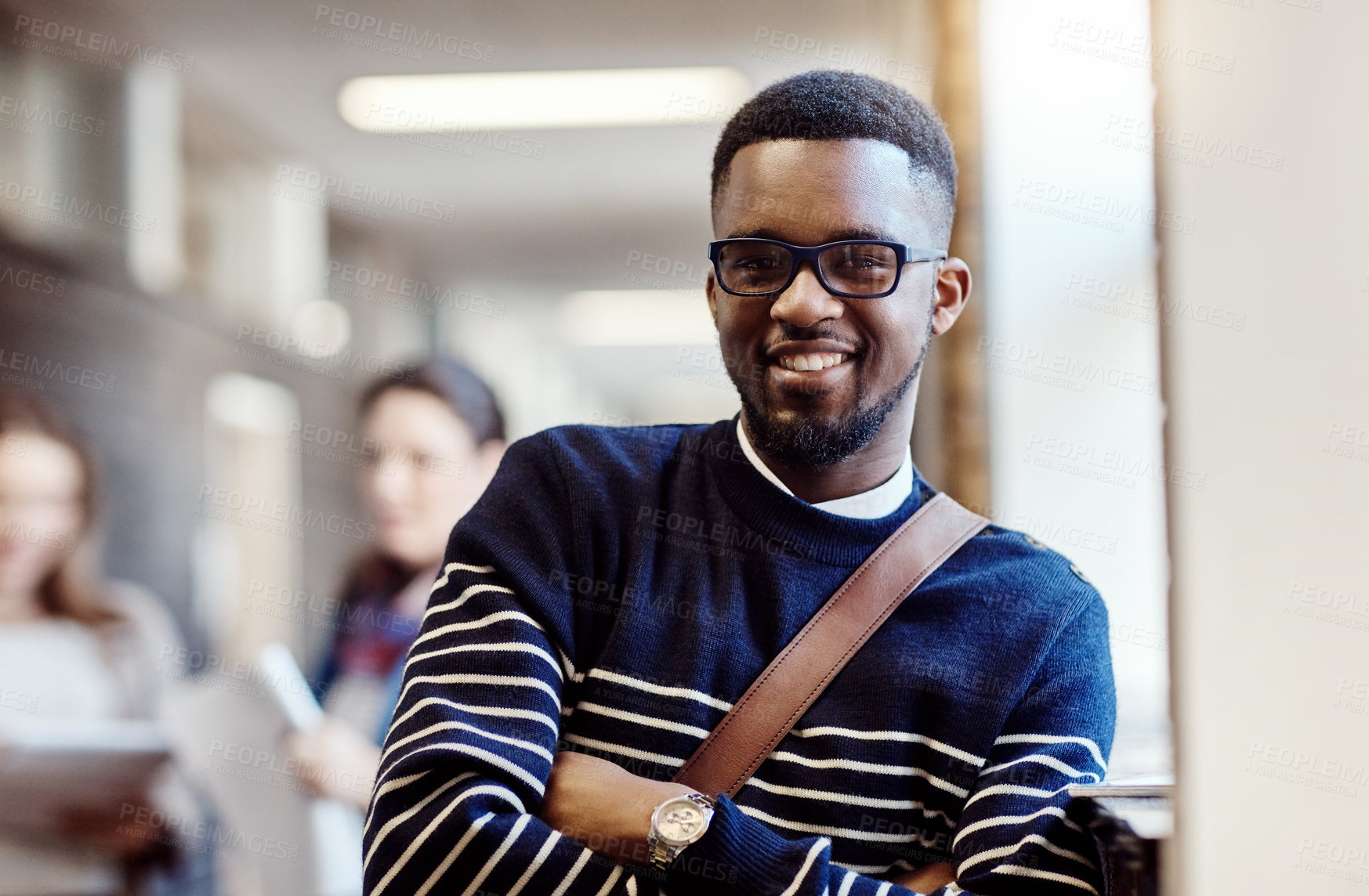 Buy stock photo Portrait, hallway and man with backpack, knowledge and proud of scholarship for college or learning. Corridor, university student and smile for education, arms crossed and person in campus or glasses