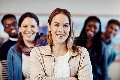 Buy stock photo Portrait of a group of confident young university students standing together at campus