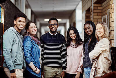 Buy stock photo Portrait of a group of confident young university students standing together at campus