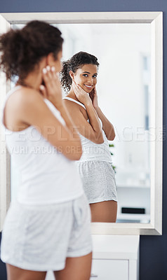 Buy stock photo Woman, mirror and face with check in house, inspection for self care or wellness in house. Female person, glass reflection and hand for skin care in bedroom, natural or clean beauty in apartment