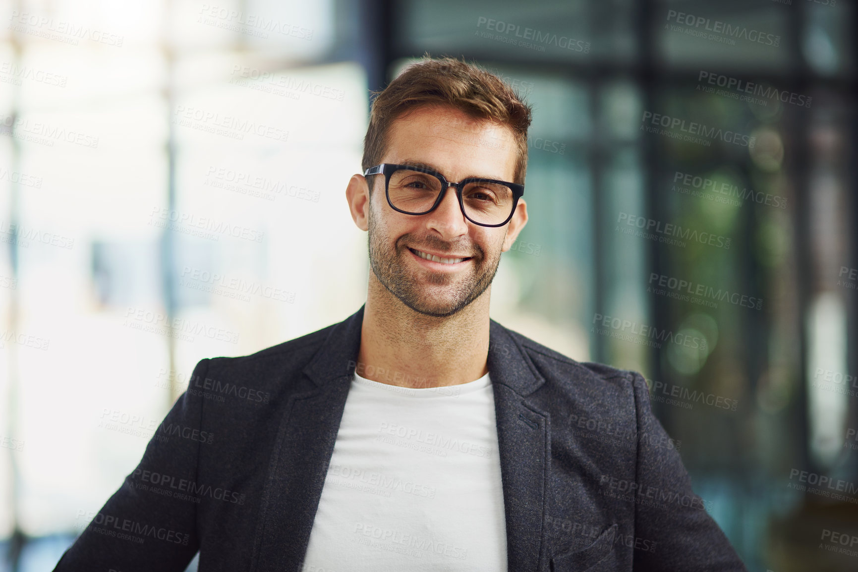 Buy stock photo Portrait shot of a handsome businessman at the office