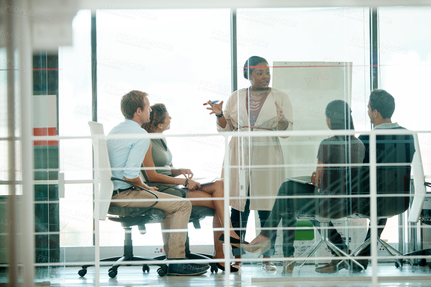 Buy stock photo Business people, presentation and woman in meeting, feedback and brainstorming for project. Group, employees and presenter with planning, diversity and leadership with review, workshop and coaching