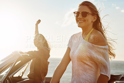 Buy stock photo Happy, portrait and woman with travel by ocean for outdoor adventure, vacation or break in convertible. Smile, summer and friends with drive on road trip for holiday, sunset and freedom in Croatia