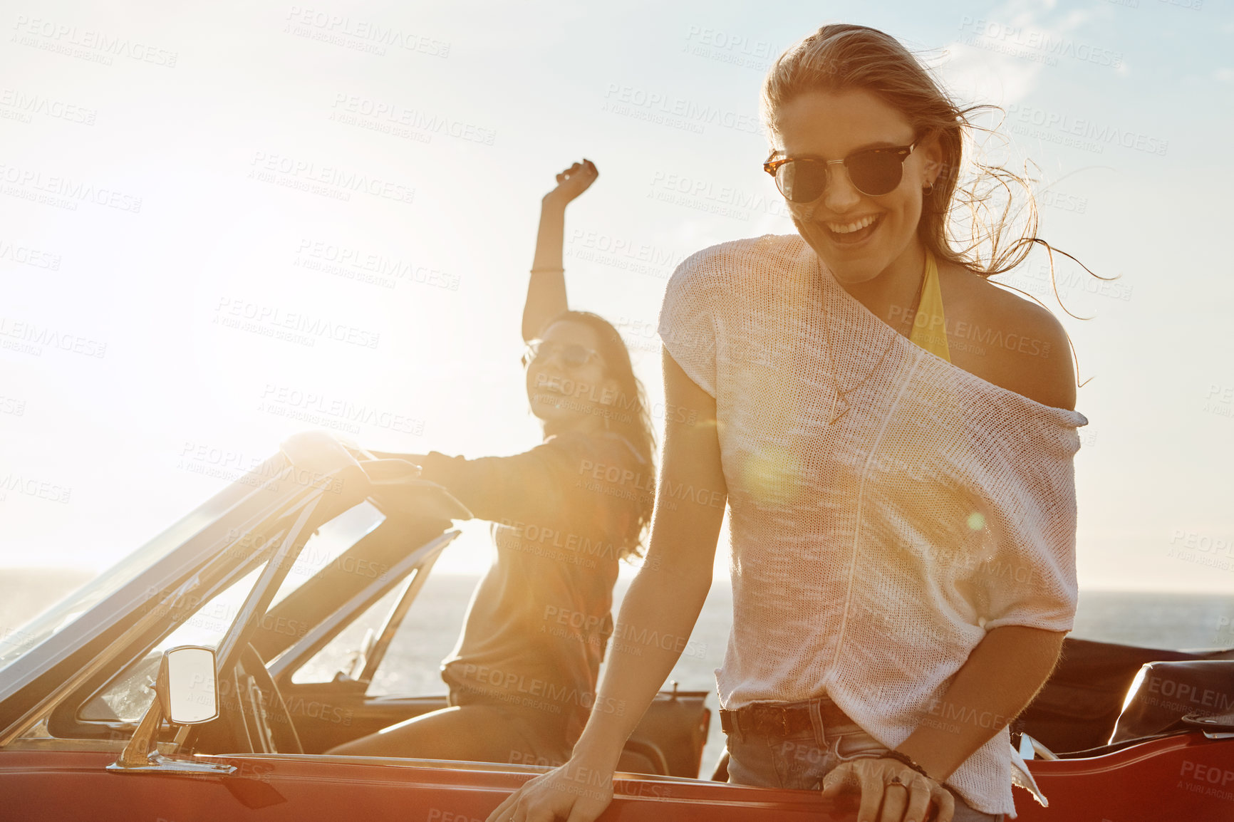 Buy stock photo Car, portrait and people with travel by ocean for outdoor adventure, freedom or break in convertible. Happy, summer and friends with smile on road trip for holiday, sunset and tourism in Croatia