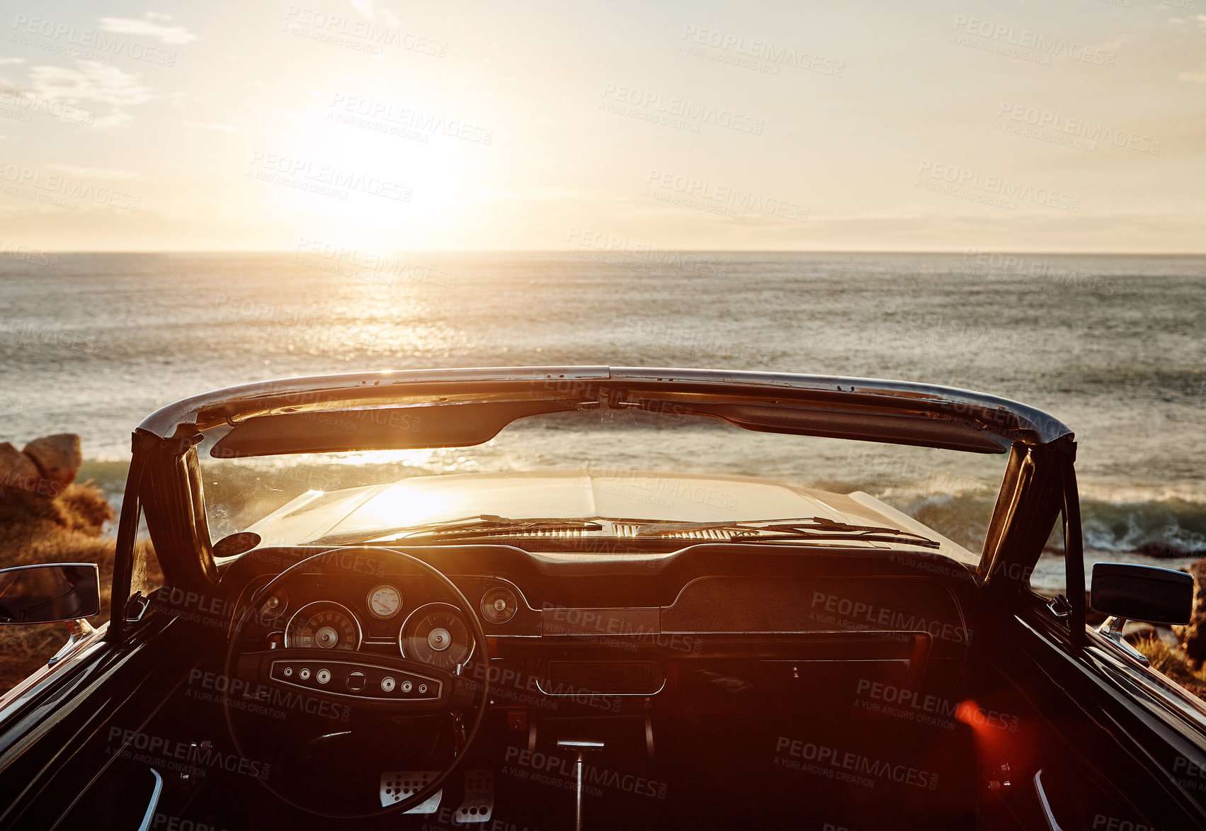 Buy stock photo Vintage, car and sunset at beach for view with road trip, adventure or scenery with mockup space. Empty vehicle, convertible and transport on coast at seaside for ocean sunrise, travel or sightseeing