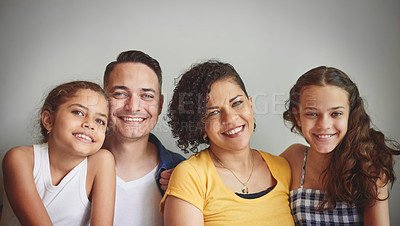 Buy stock photo Portrait of a happy young family spending quality time together