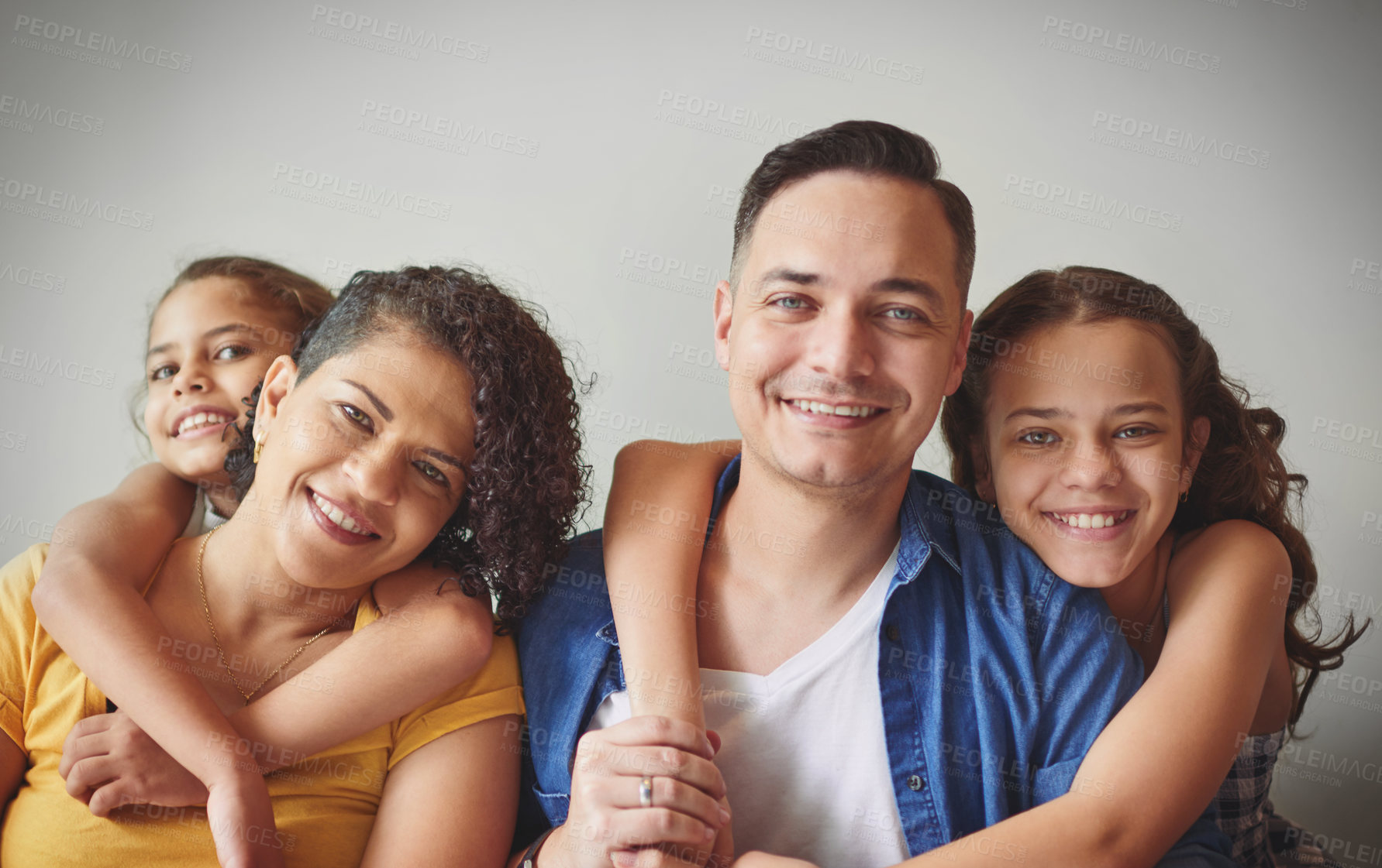 Buy stock photo Portrait, happy and parents with children house for love, security and bonding together of relationship. Smiley, kids and family support with care, embrace and connection for childhood development