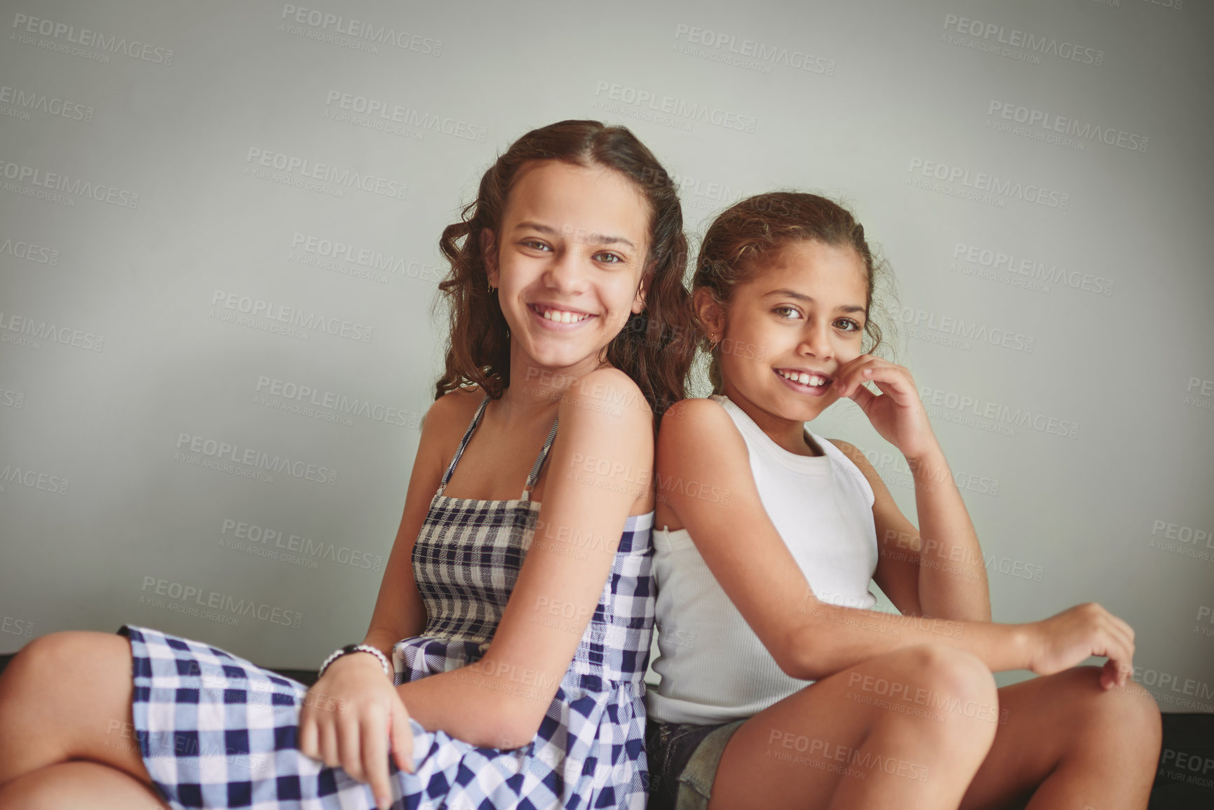 Buy stock photo Portrait, happy children and girls for health, together or bonding on wall background as family. Smile, kids and siblings with confidence, teeth and oral care for hygiene, dentist or wellness in home