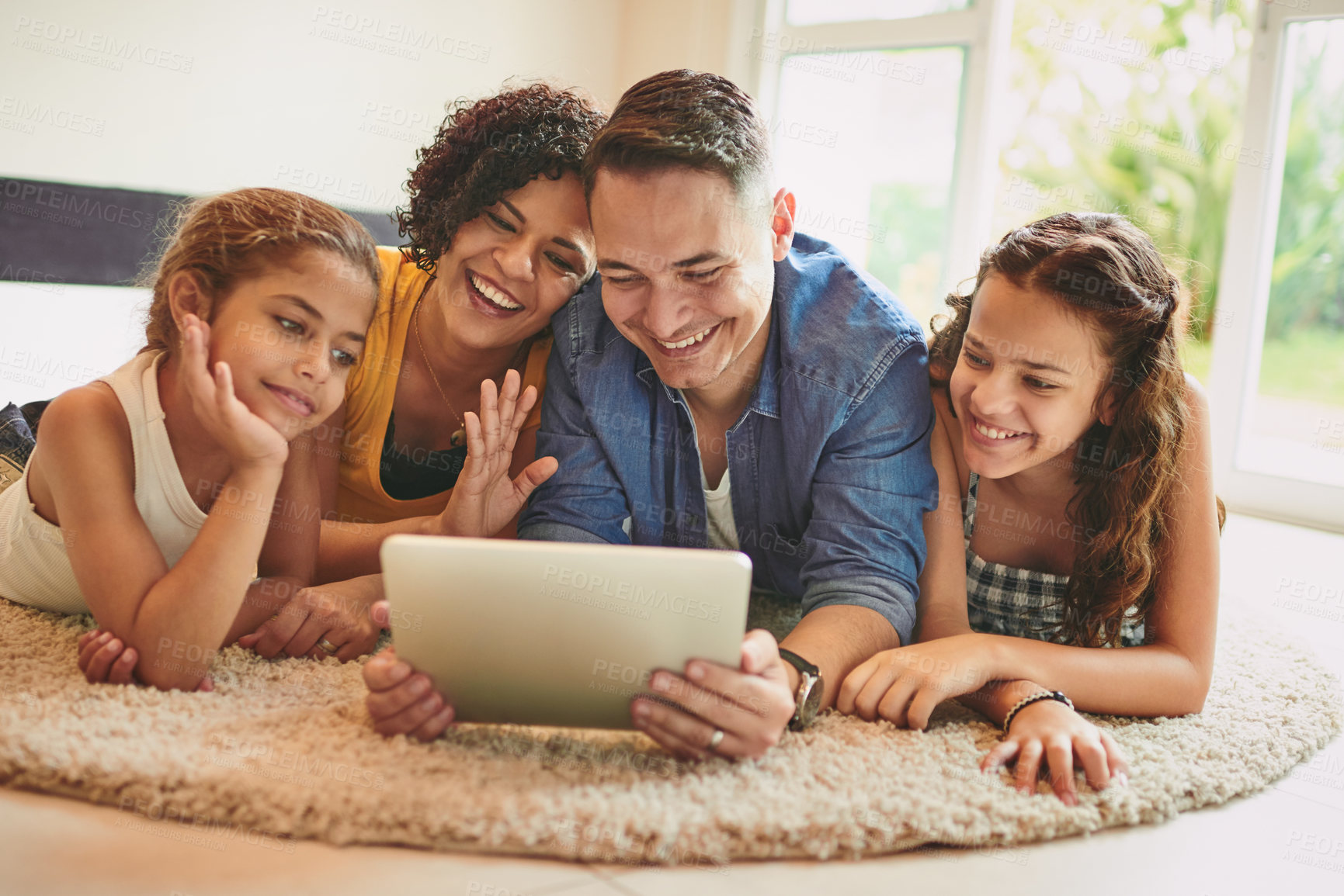 Buy stock photo Tablet, video call and family waving in home for online communication, contact or networking. Connectivity, digital technology and children with parents for greeting on virtual conversation at house.