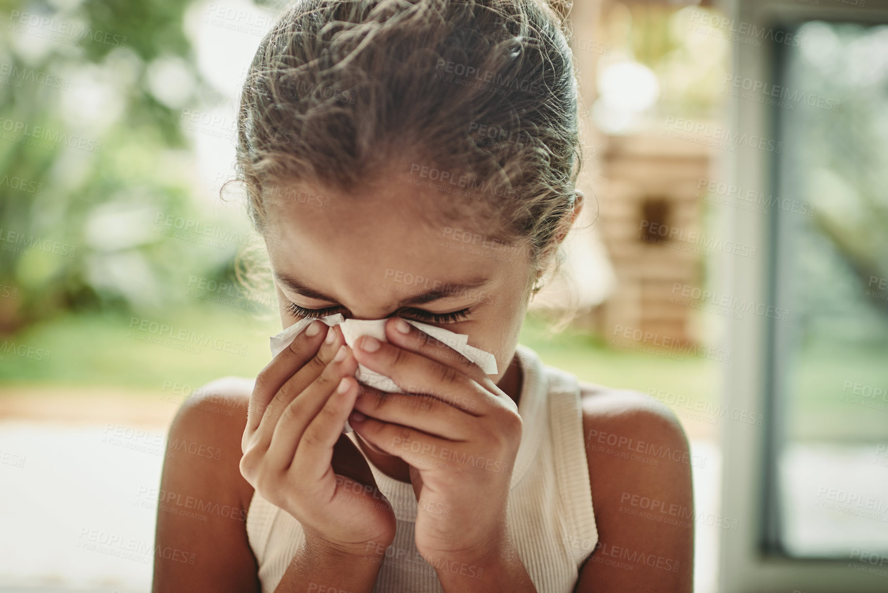 Buy stock photo Face, child and girl crying in tissue at home with sad tears, spring allergy or flu virus in morning. Cold, sinus infection and sick young kid blowing nose with paper, health and wellness in house