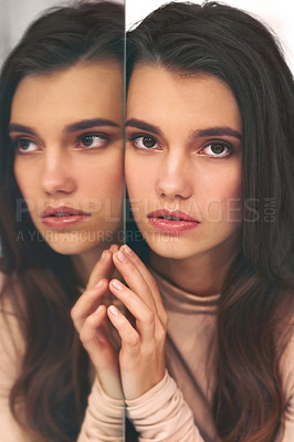 Buy stock photo Portrait of a beautiful young woman leaning against a mirror