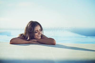 Buy stock photo Relax, holiday and summer with woman and swimming pool for wellness resort, vacation and peace. Luxury, mockup space and smile with female person at hotel getaway for calm, happiness and zen