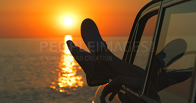 Buy stock photo Sunset, beach and feet by window of car on road trip for tropical holiday, vacation or adventure. Travel, relax and person with shoes in vehicle by ocean on summer evening by coast for destination.