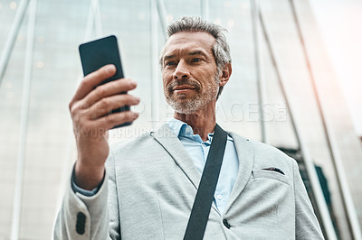 Buy stock photo Corporate, man and travel with phone in city of morning commute, communication and transport service. Professional, male lawyer and mobile app with taxi request, meeting schedule and urban location