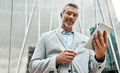 Buy stock photo Outdoor, businessman and happy with tablet on portrait for communication and networking in city. Mature person, from below and employee with internet for news on stock market, economy and inflation