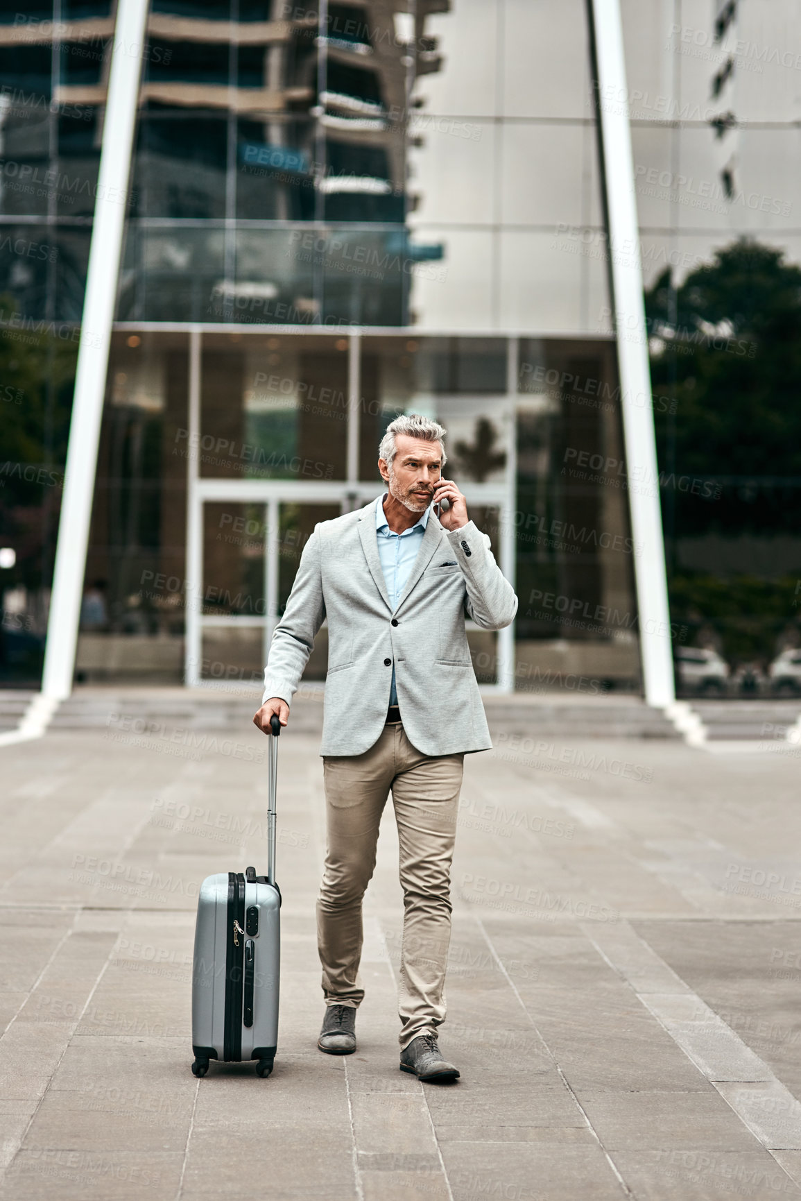 Buy stock photo Professional, man and suitcase with phone call in city for communication, commute and transport service. Corporate, lawyer and luggage with mobile for booking flight, travel schedule and direction