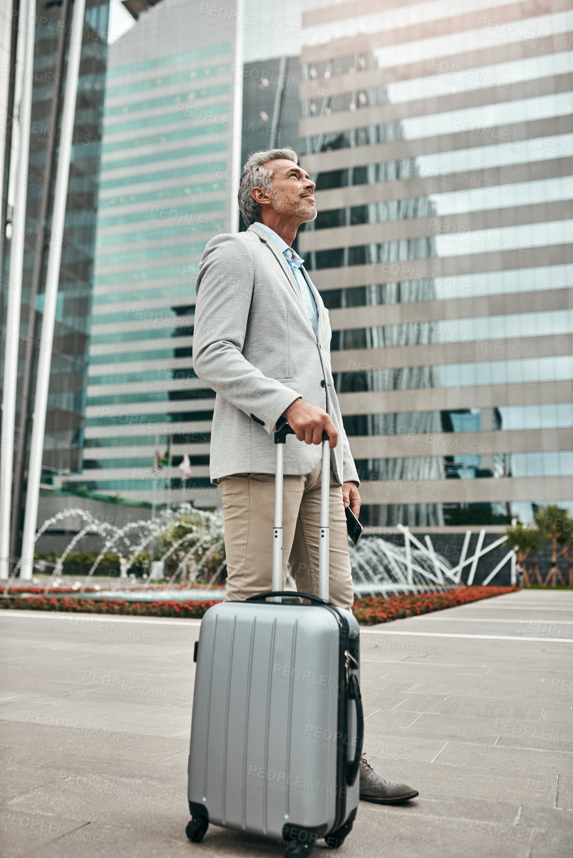 Buy stock photo Mature, businessman and walk with suitcase, city and thinking as real estate agent. Male person, luggage and morning commute for accommodation, travel and career in property market evaluation in USA