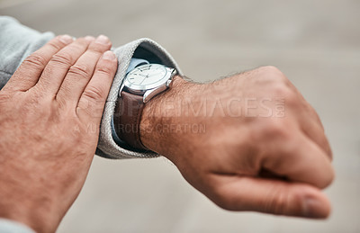 Buy stock photo Closeup shot of an unrecognizable businessman checking the time on his wrist watch
