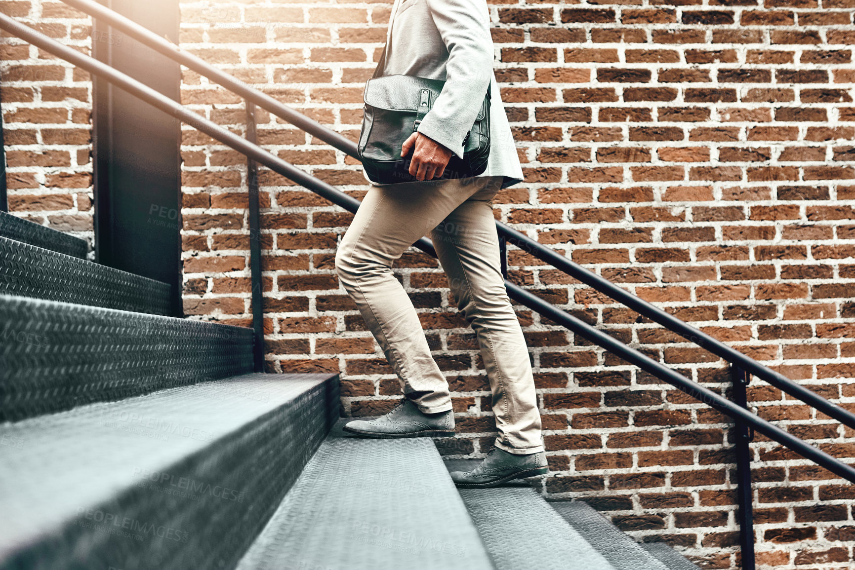 Buy stock photo Businessman, legs and walking in city, stairs and commute in urban town to office building. Male person, shoes and professional on journey to workplace, outdoor and employee travel on steps to metro