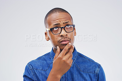 Buy stock photo Thinking, glasses and man in studio with idea for choice, decision and options on white background. Question, wondering and face of isolated person in doubt for solution, problem solving and planning