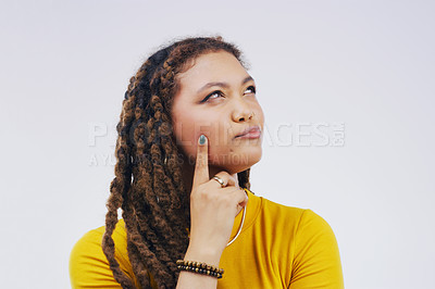 Buy stock photo Thinking, idea and gen z girl in studio with decision on mockup, space and grey background. Doubt, confused and female person contemplating, choice and solution, problem solving and puzzled emoji
