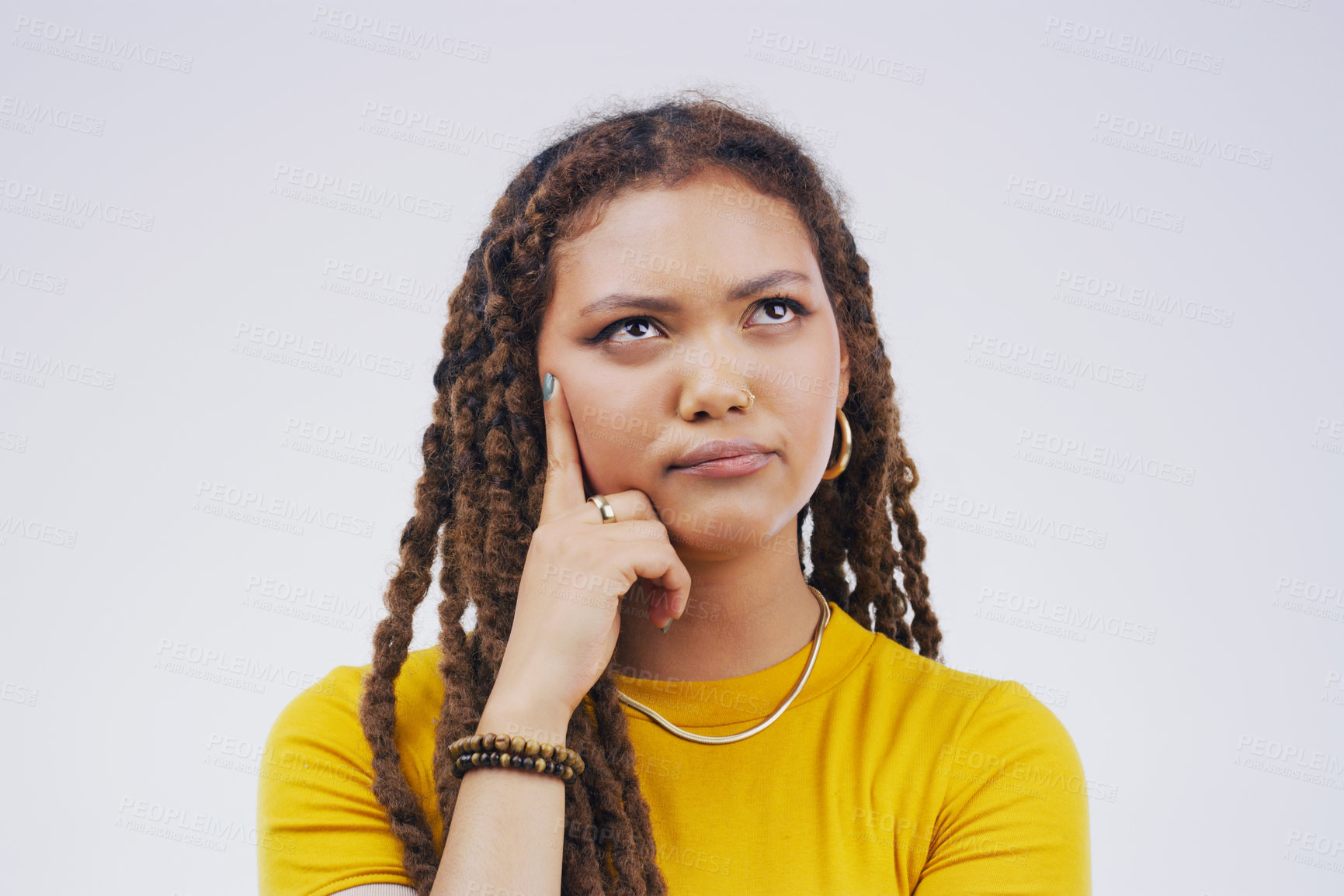 Buy stock photo Doubt, confused and gen z girl thinking in studio on mockup, space and white background. Choice, problem solving and female model decide, puzzled face and unsure of decision or option and idea emoji