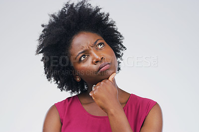Buy stock photo Black woman, thinking and confused in studio with decision or choice on space pr grey background. Doubt, unsure and African female person contemplating, solution and emoji, puzzled and skeptical